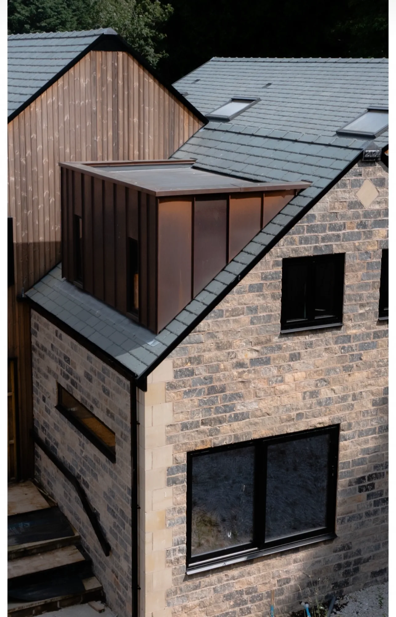 Bespoke Slate New Build with Copper Dormers