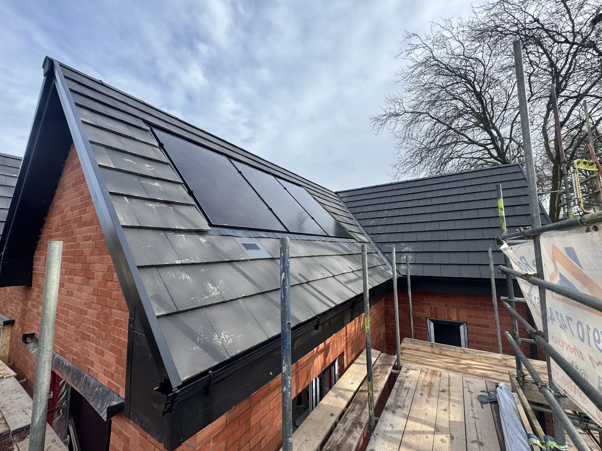 Close-up of an integrated in-roof solar array on new tiles