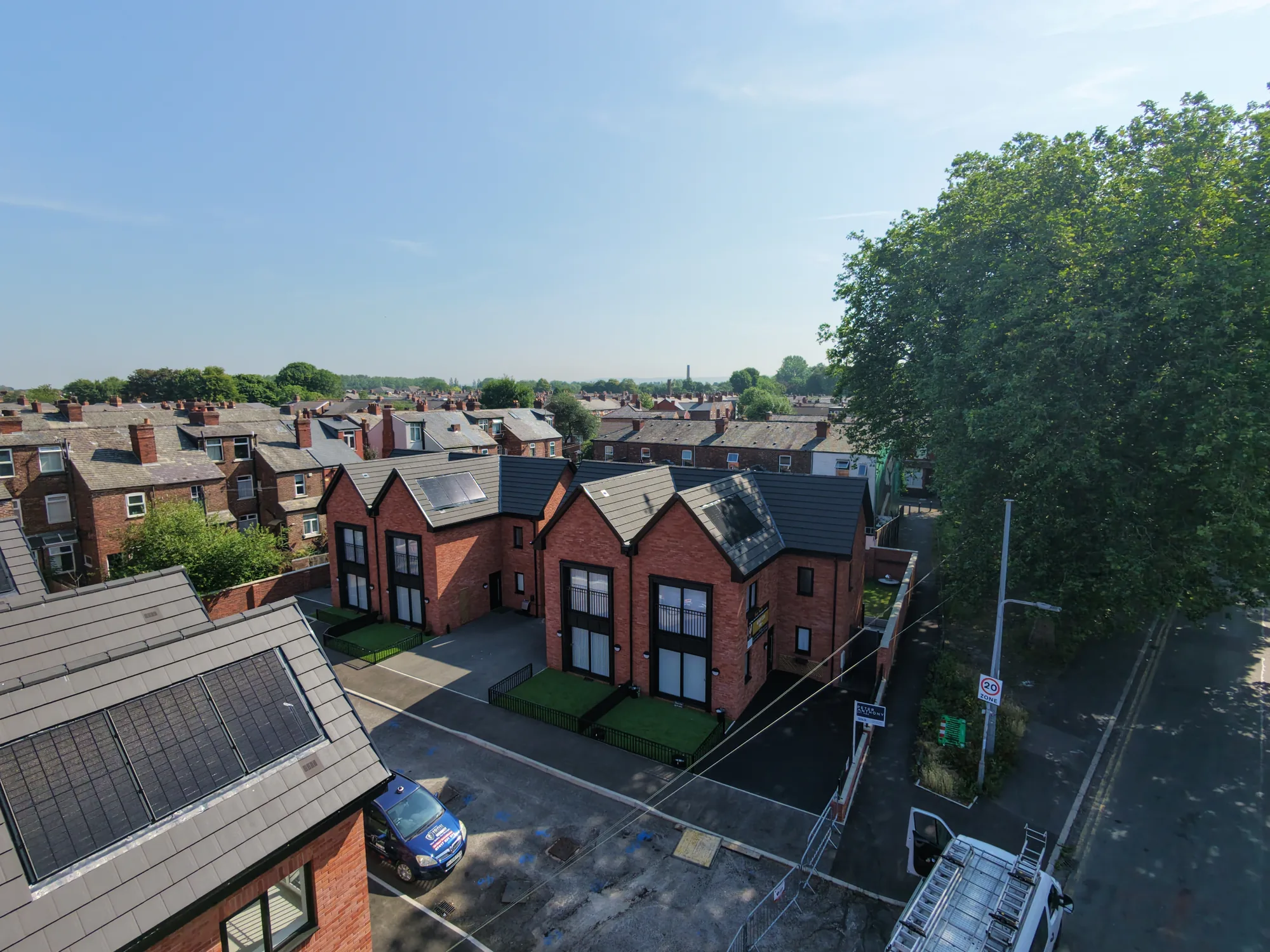 New homes with integrated solar roofing viewed by drone