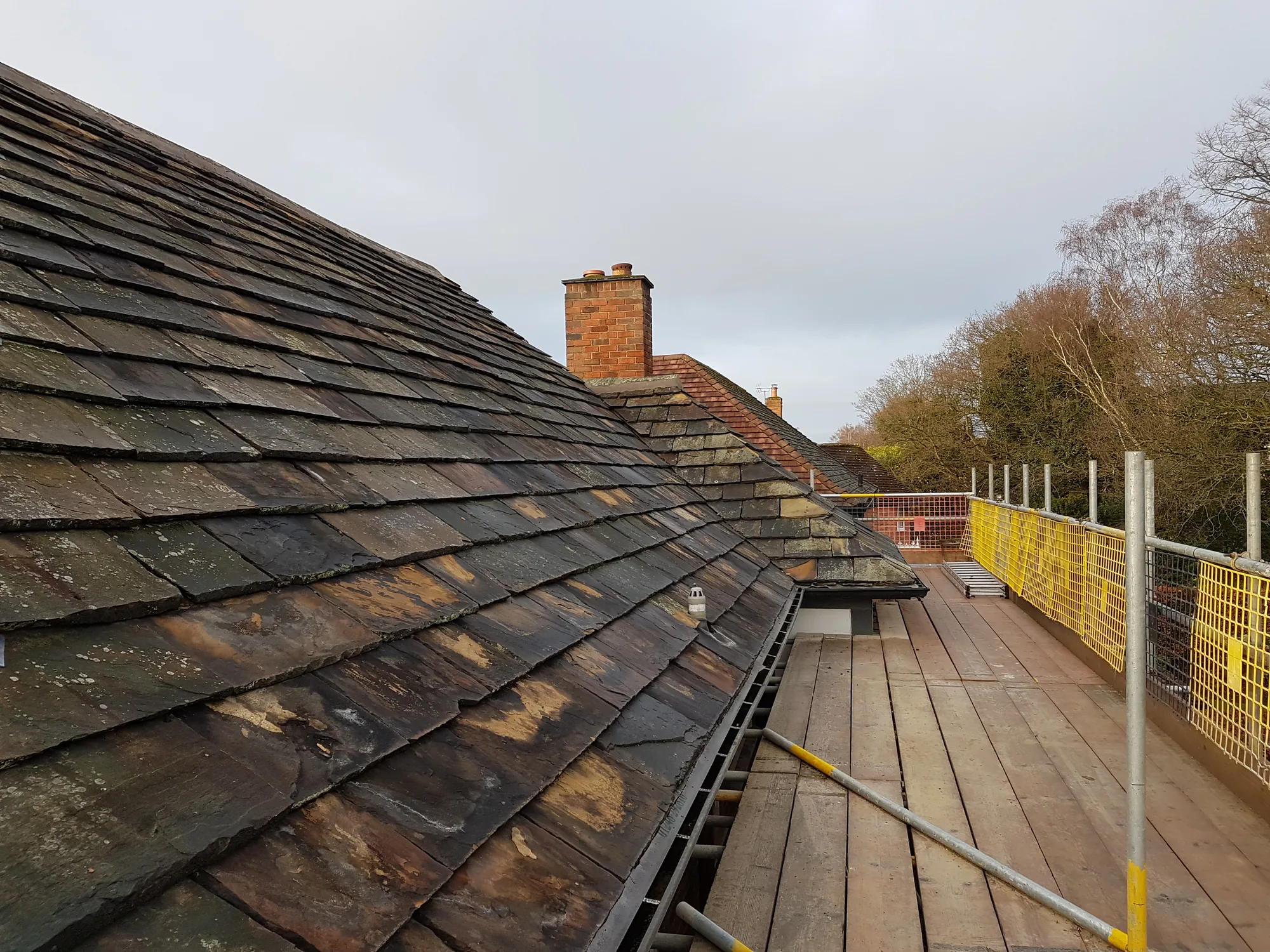 Traditional stone slate roof by The Roofers Blackpool