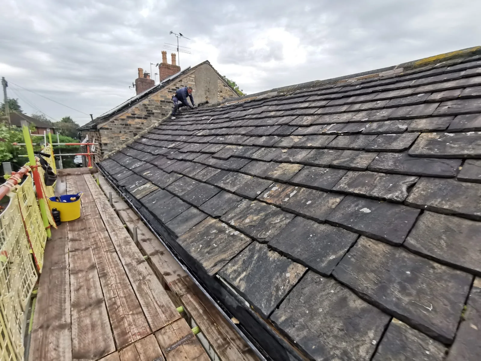 Traditional stone slate roof by The Roofers Blackpool