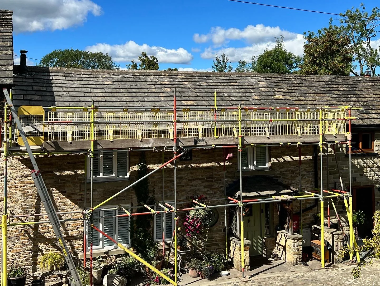 Traditional stone slate roof by The Roofers Blackpool