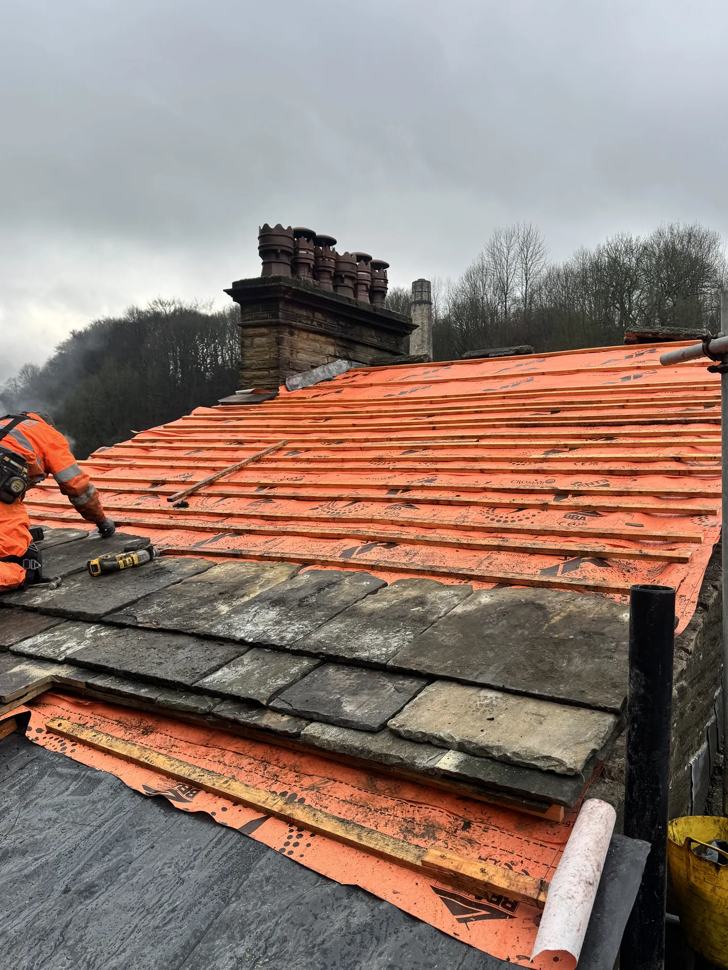 Traditional stone slate roof by The Roofers Blackpool
