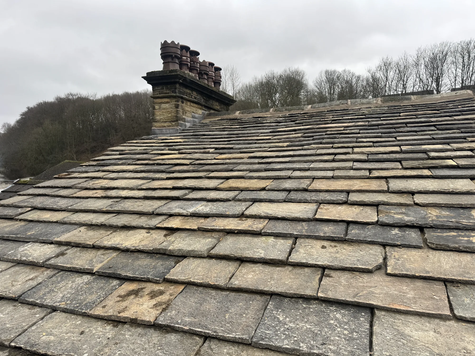 Traditional stone slate roof by The Roofers Blackpool