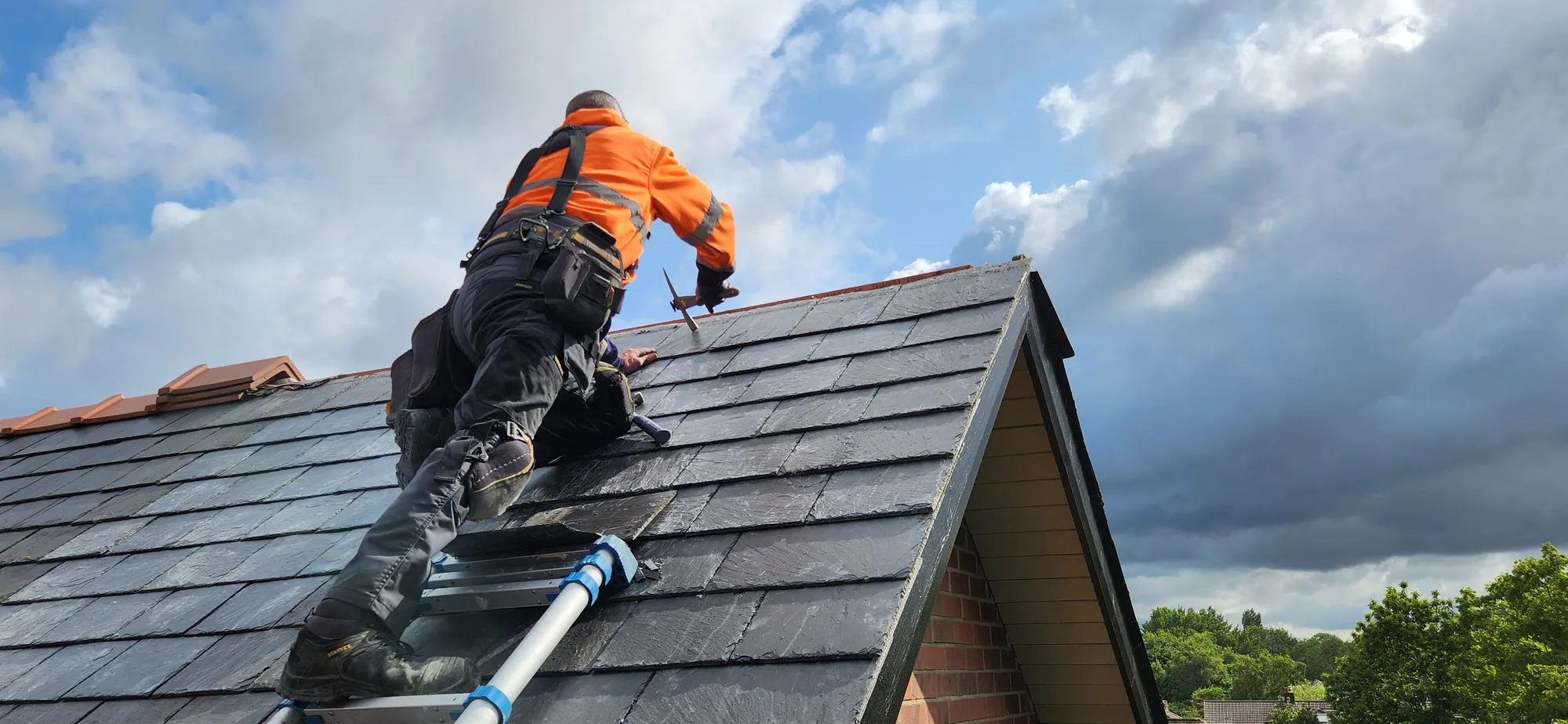 Mark O'Reilly and the team fitting a new slate roof in Blackpool